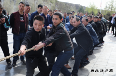 陕煤陕北矿业涌鑫公司举行“庆百年、迎五一、展风采”拔河比赛