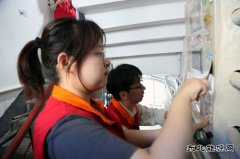 国网佳木斯供电公司：治理城市“牛皮癣” 美化环境“靓”社区